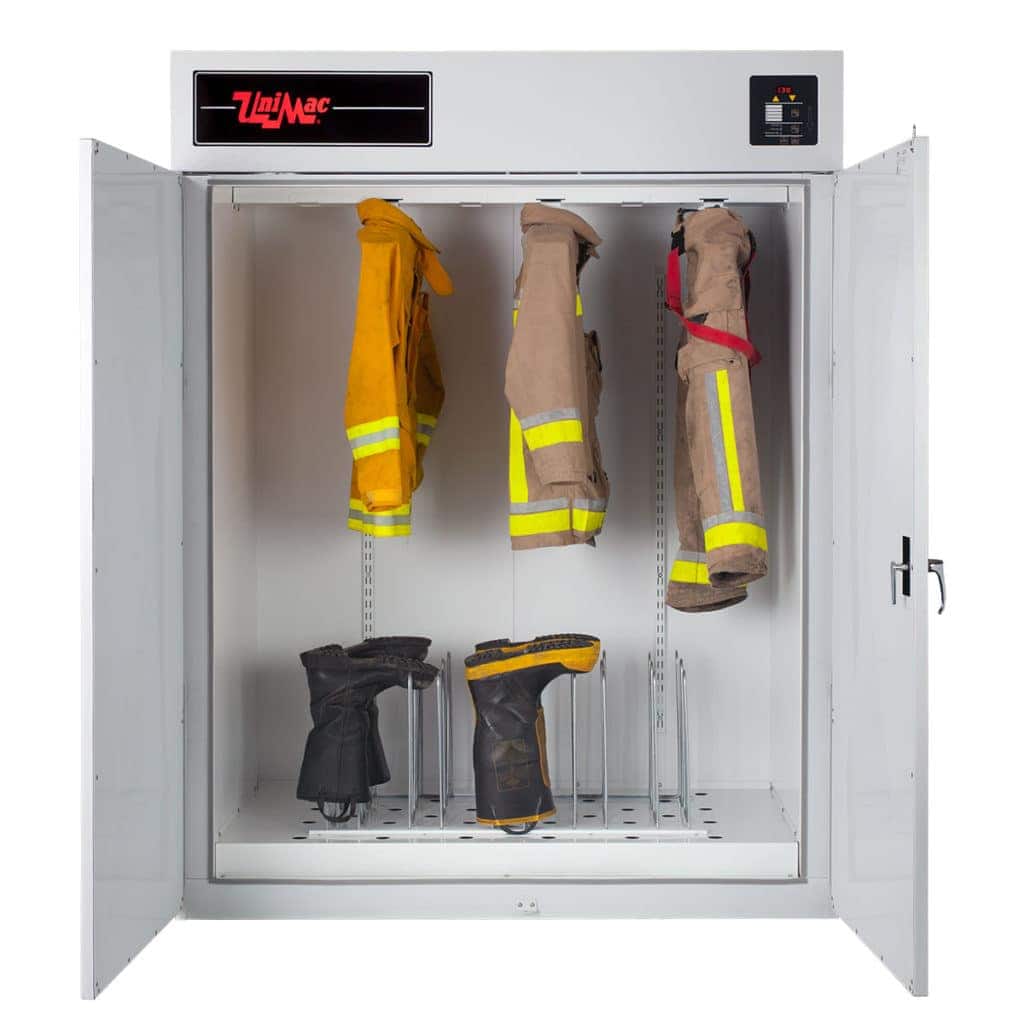 Open cabinet holding firefighter turnout gear; coats and boots on racks